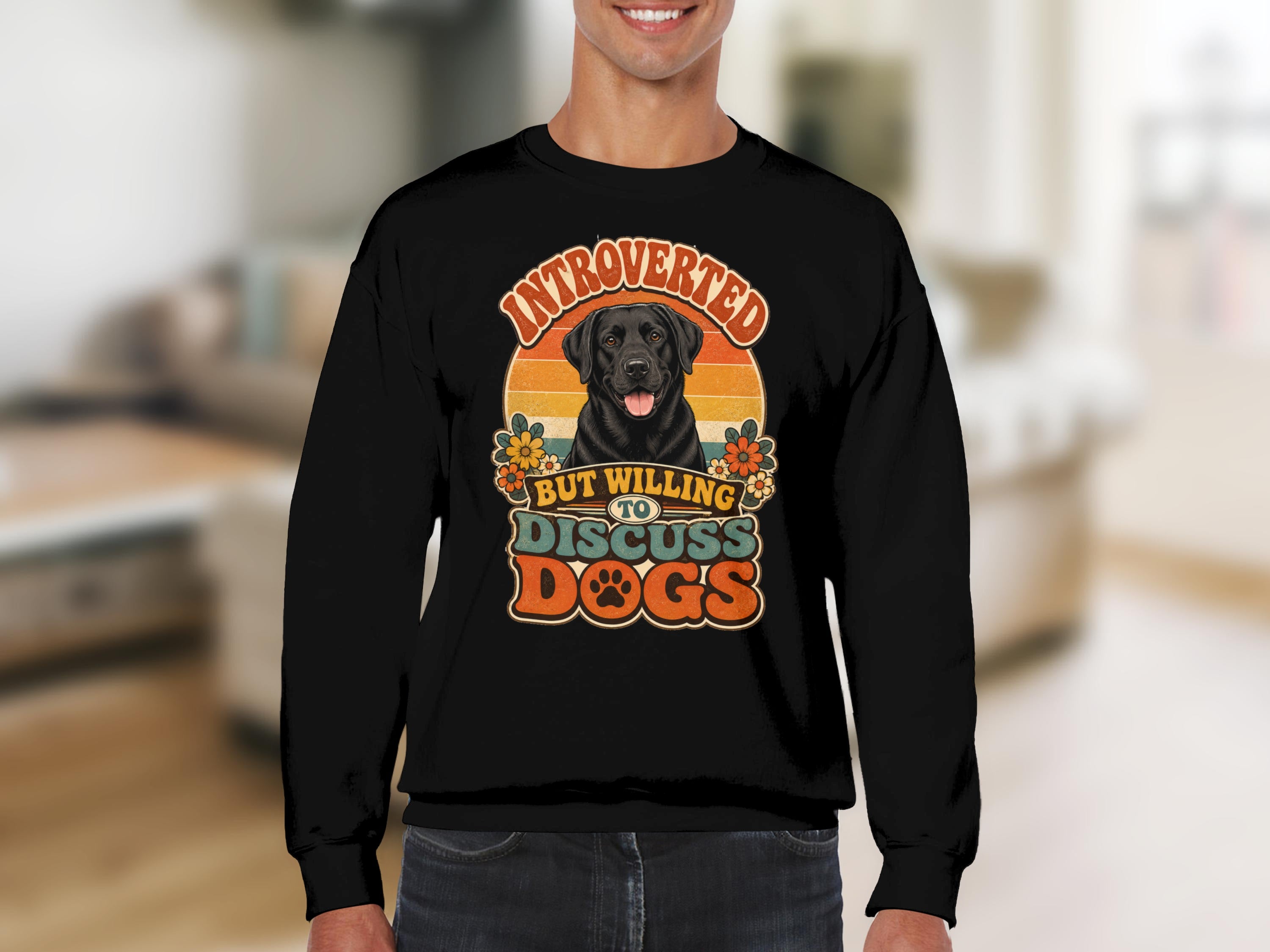 Black sweatshirt with "Introverted But Willing To Discuss Dogs" text and dog graphic.