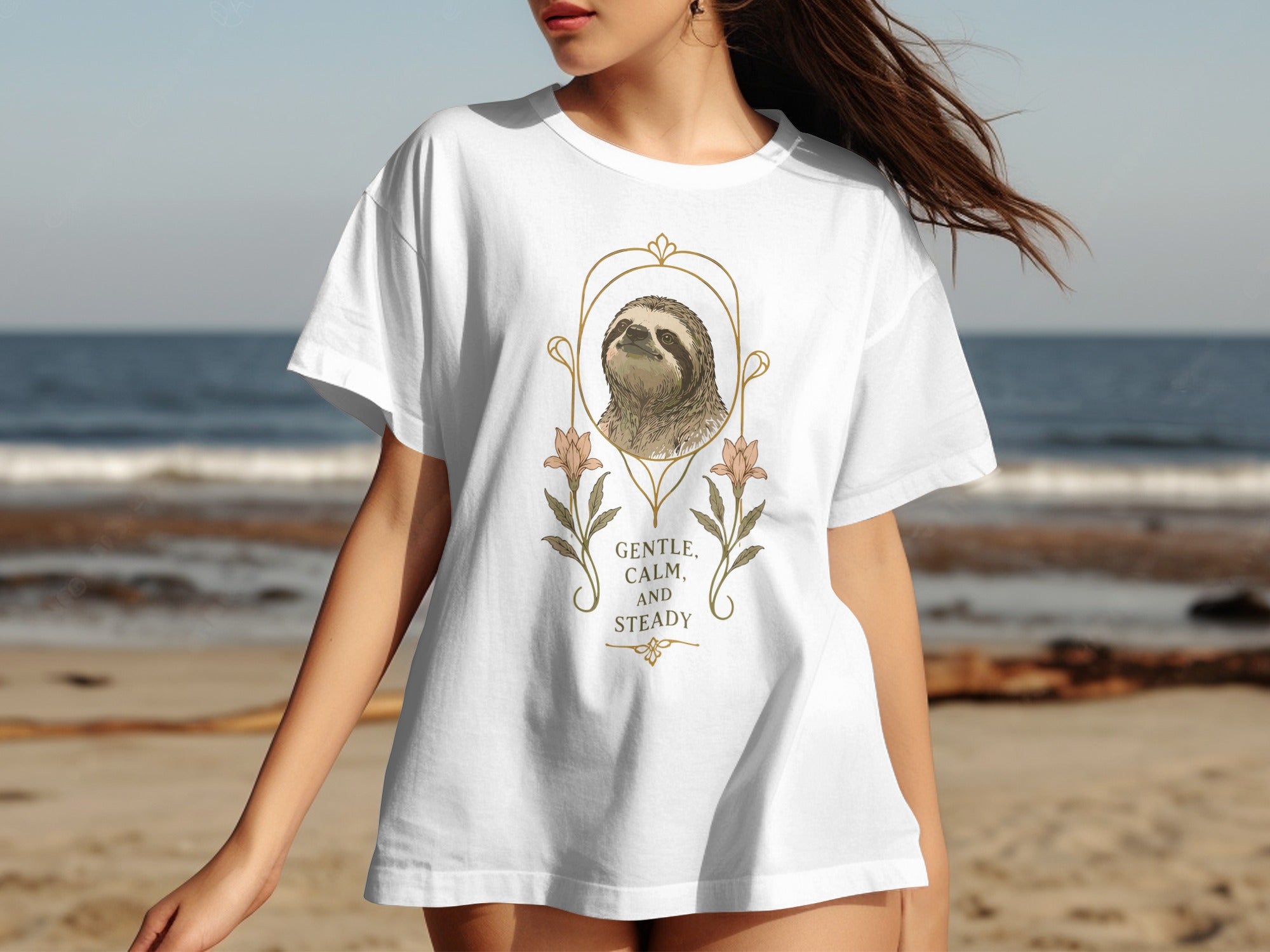 White t-shirt with sloth illustration and "Gentle, Calm, and Steady" text.