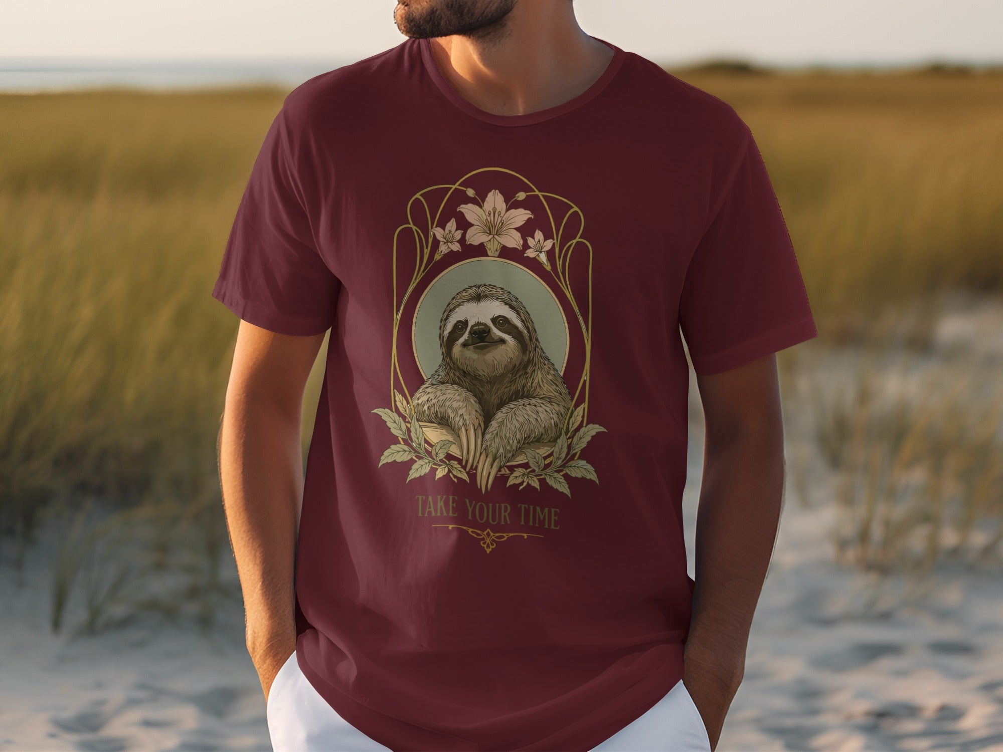 Maroon t-shirt with a sloth illustration and the text "Take Your Time".