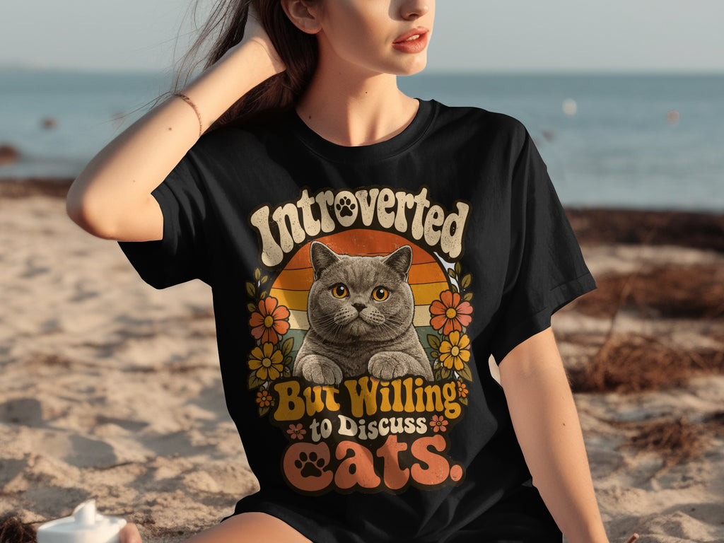 Black t-shirt with cat and flowers, reading "Introverted But Willing to Discuss Cats".