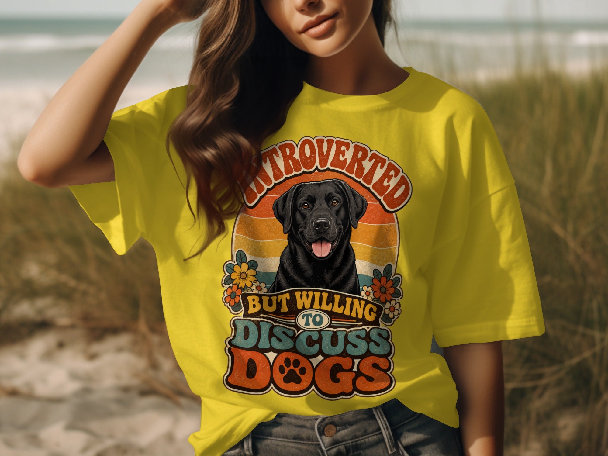 Yellow t-shirt with graphic of a black lab and text "Introverted but willing to discuss dogs."