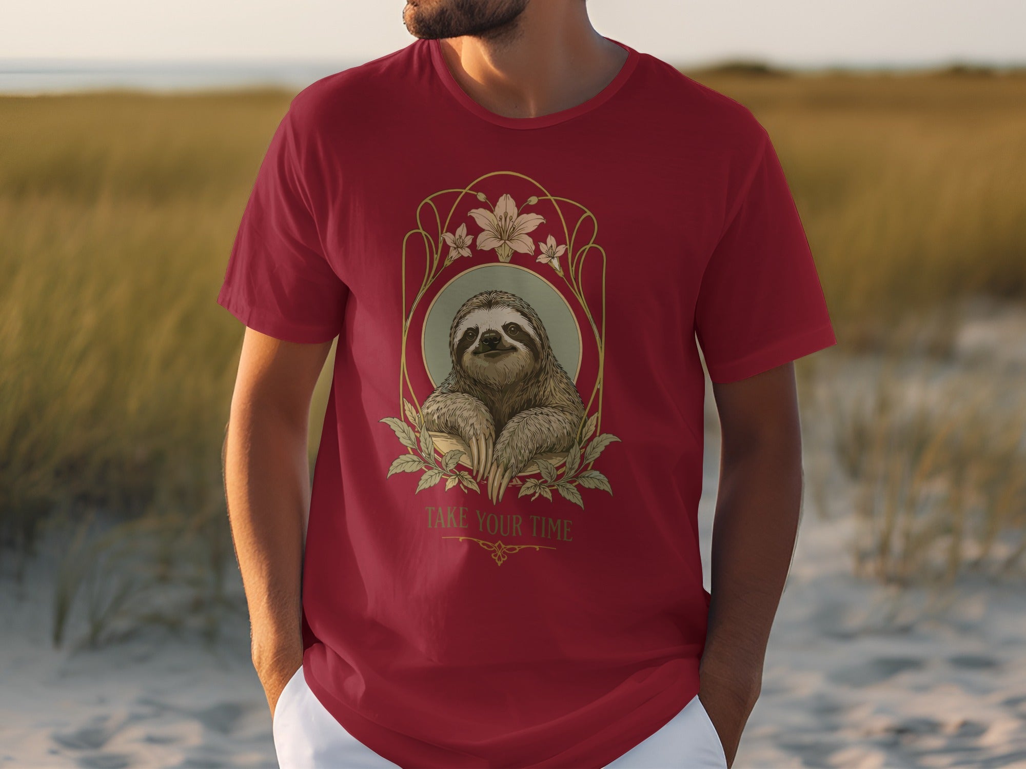 Maroon t-shirt featuring a sloth illustration with the text "TAKE YOUR TIME".