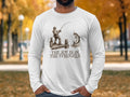 White long-sleeve shirt with "The Joy Is In The Struggle" text and fishing graphic.