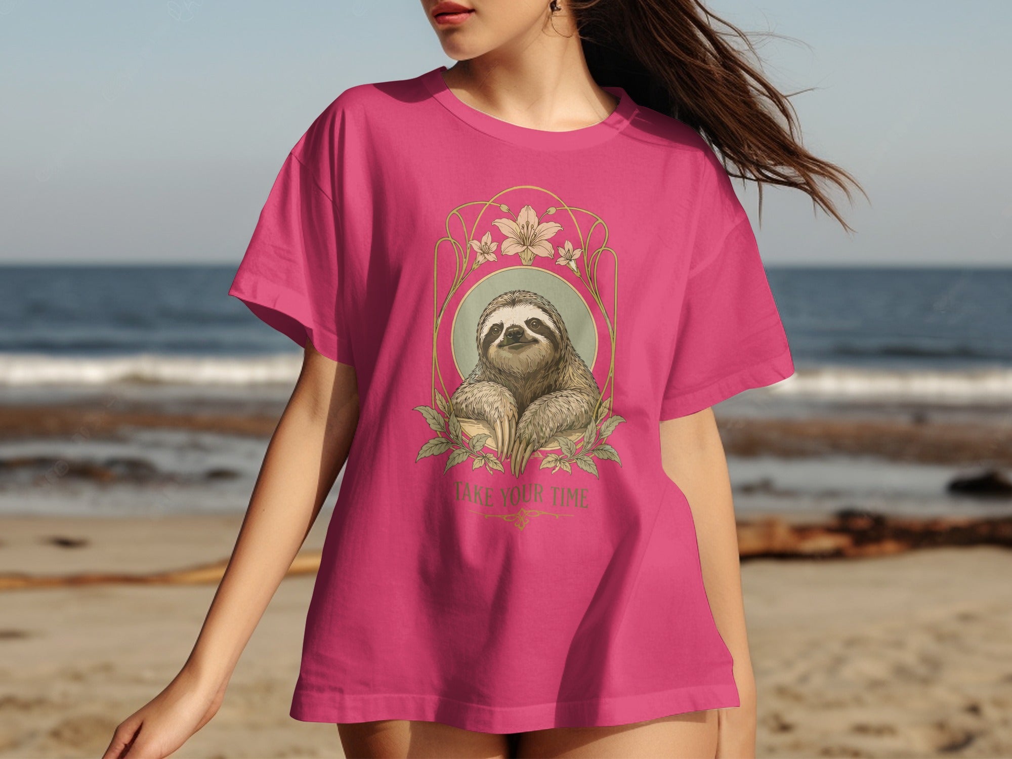 Pink t-shirt with sloth graphic and text "Take Your Time".