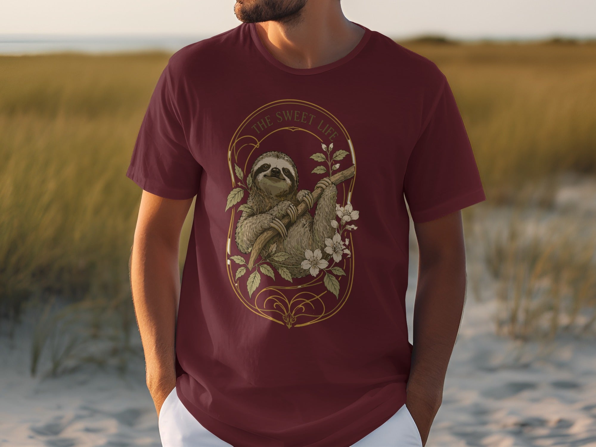 Burgundy t-shirt with sloth and flowers graphic, "The Sweet Life" text.