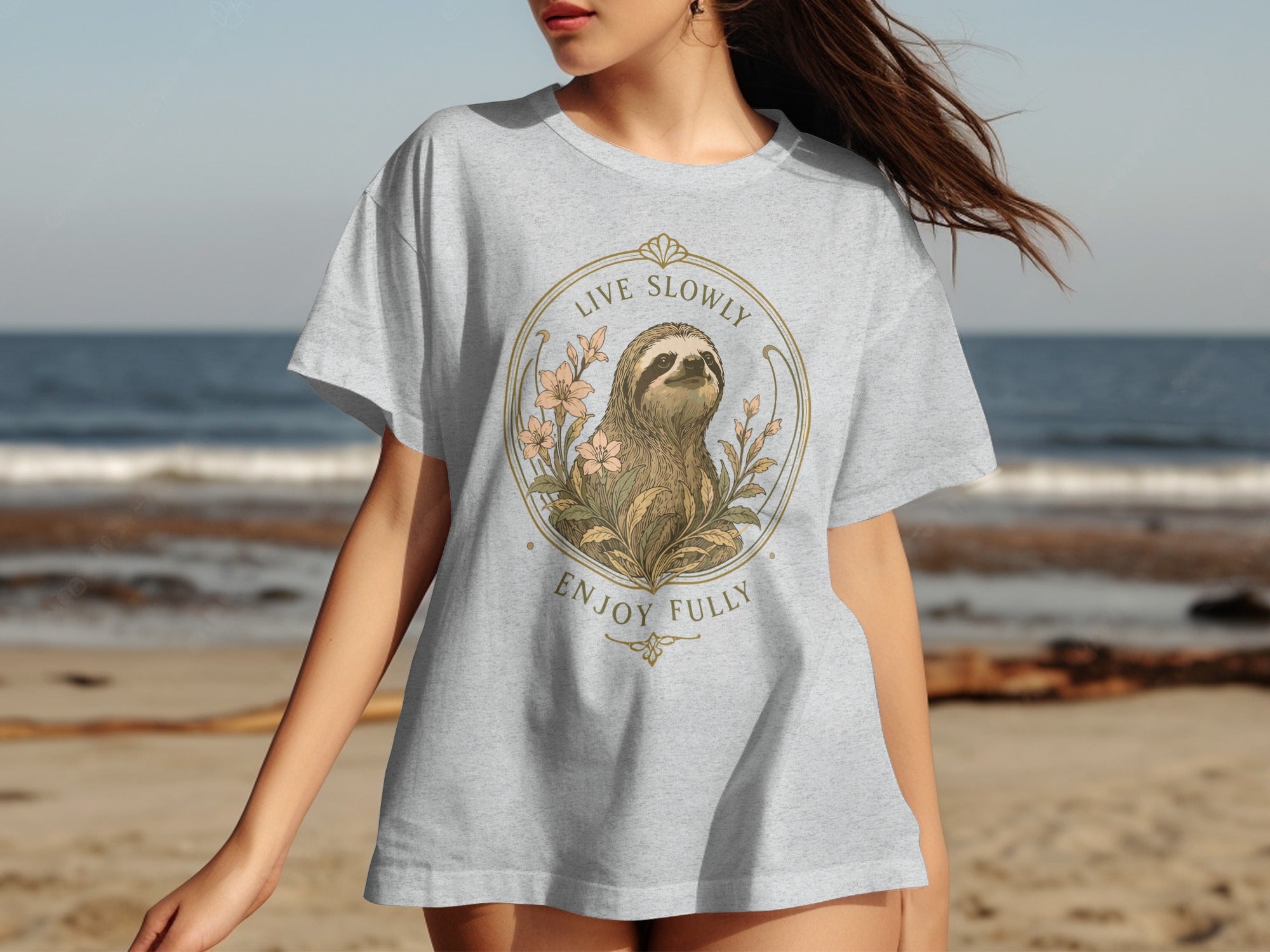 T-shirt featuring a sloth in a circular frame with flowers and text.