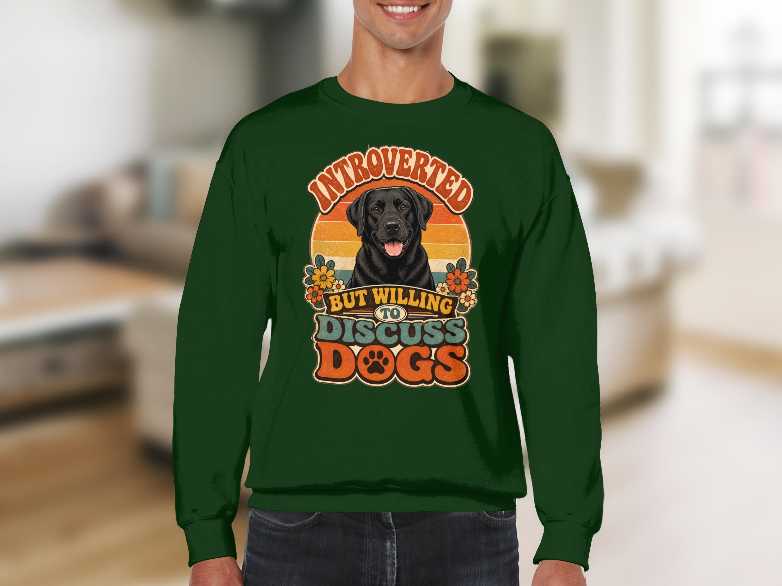 Green sweatshirt with "Introverted but willing to discuss DOGS" and a dog graphic.