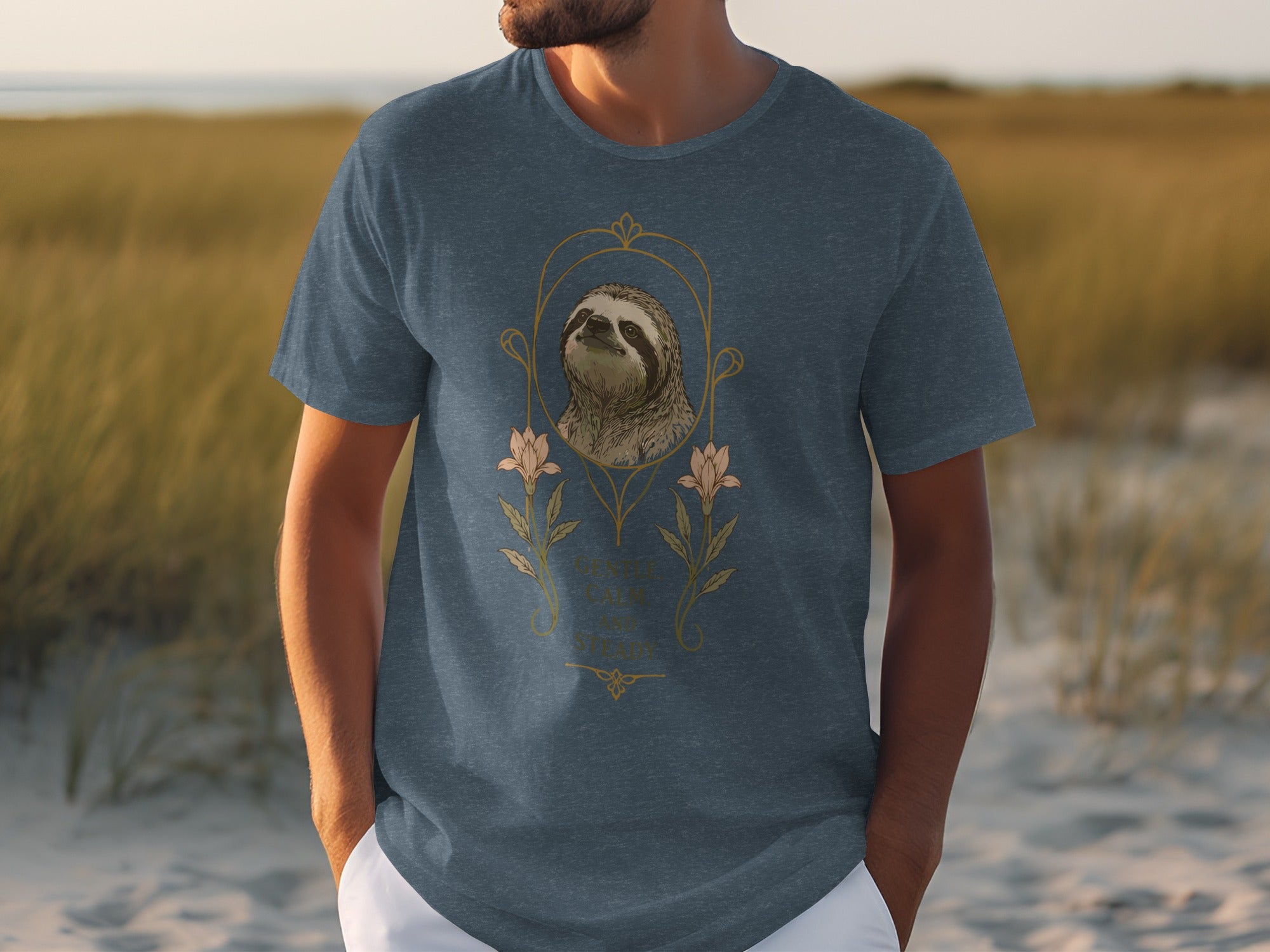 Navy t-shirt with sloth illustration and floral accents.