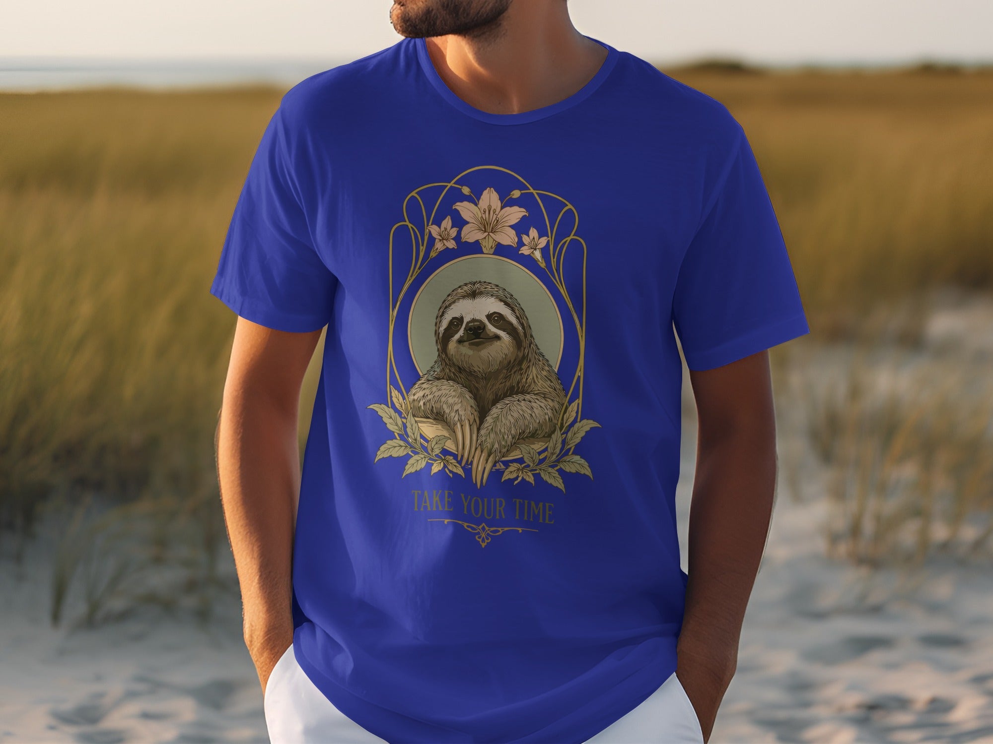 Blue t-shirt with a sloth design that reads "Take Your Time".